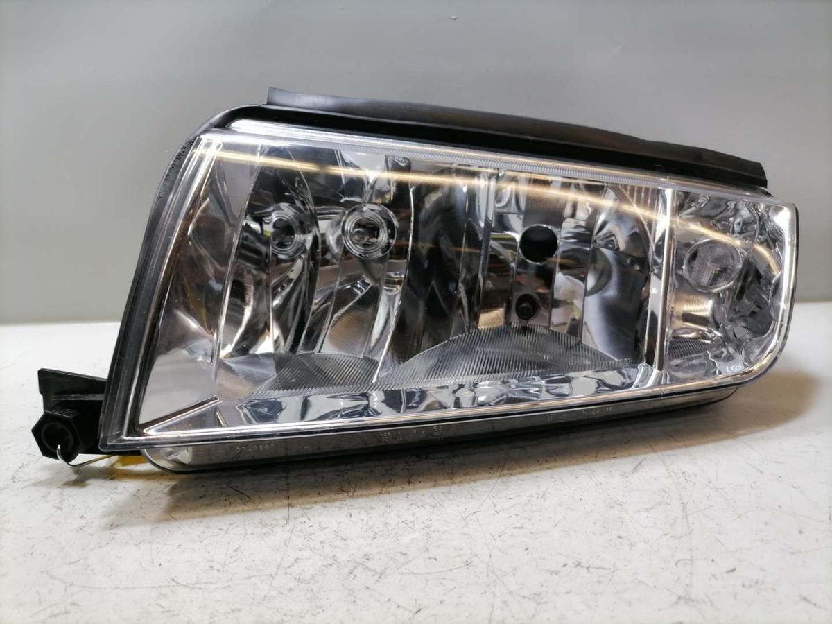 Skoda Fabia 6Y Scheinwerfer links Halogen Chrom Hintergrund Zubeh&ouml;r Bj.2007